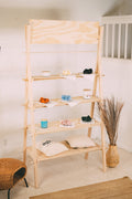 STANDRO EMS-2 four-tier wooden A-frame market display with a blank header, scrunchies, small containers and fabric bags.